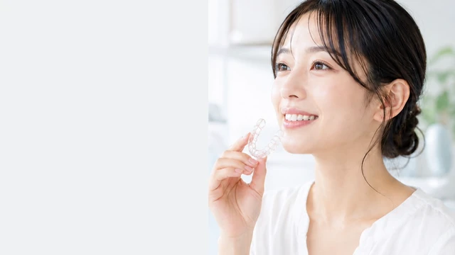 マウスピースを持つ人物のイメージ